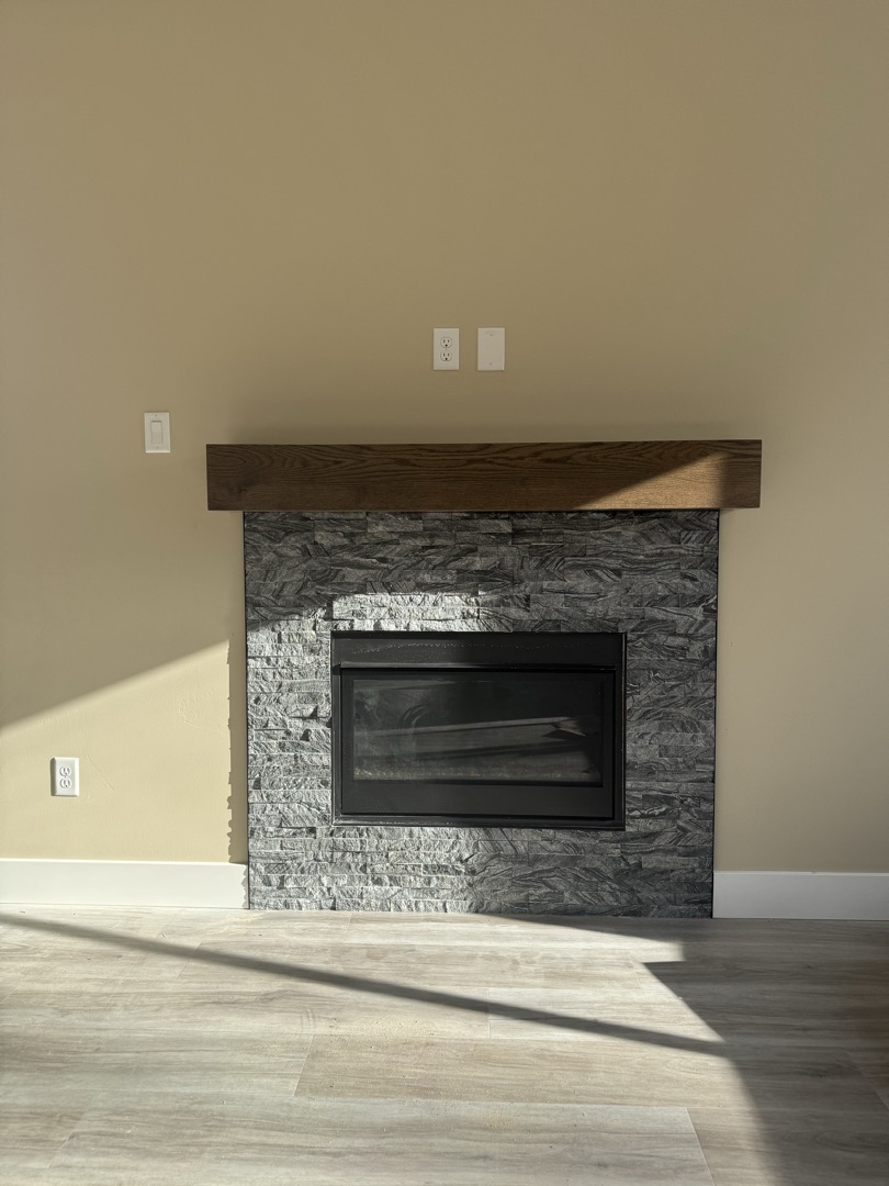 Fireplace with stacked stone veneer