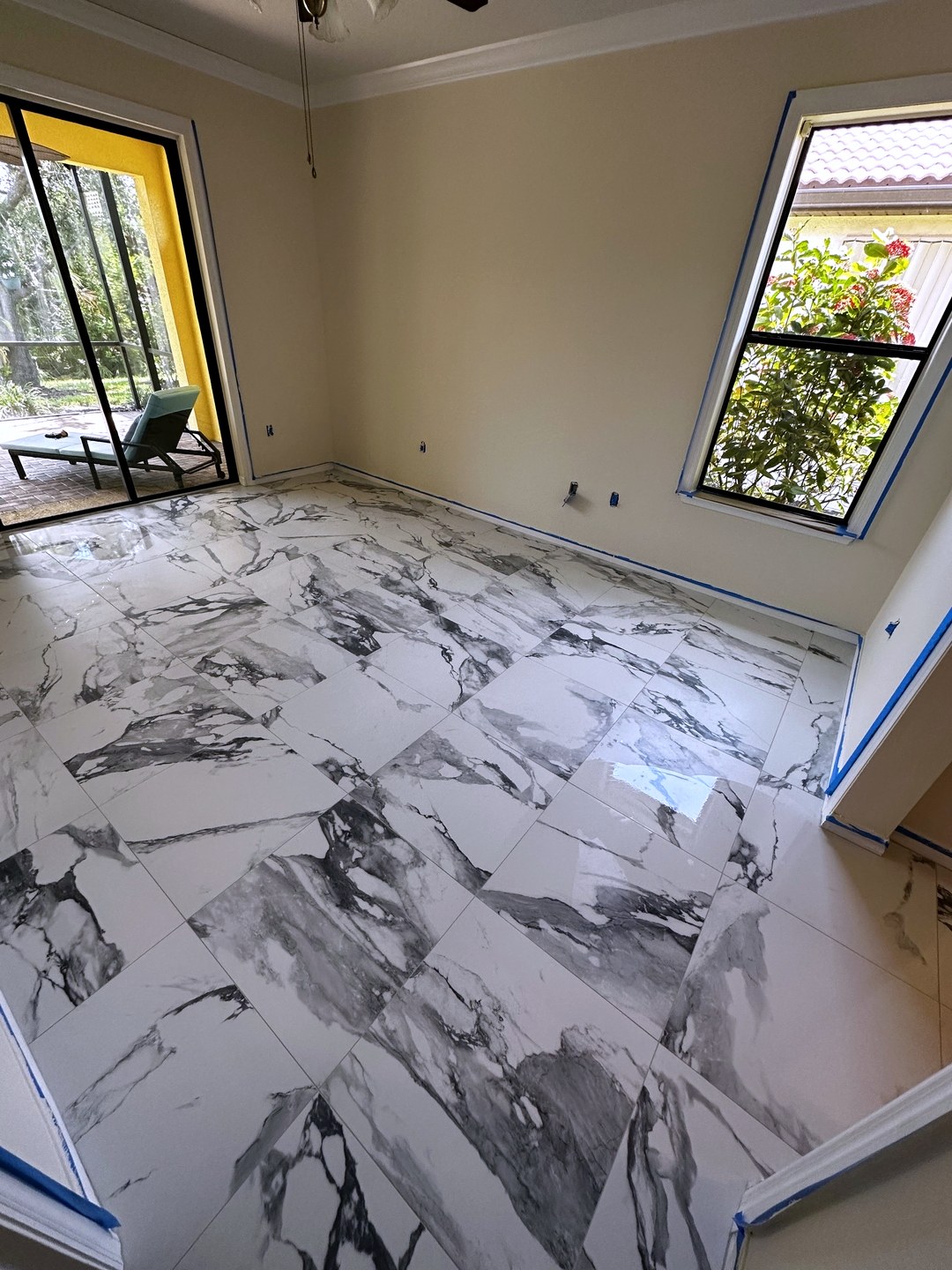 Polished white and grey marble-look floor tile