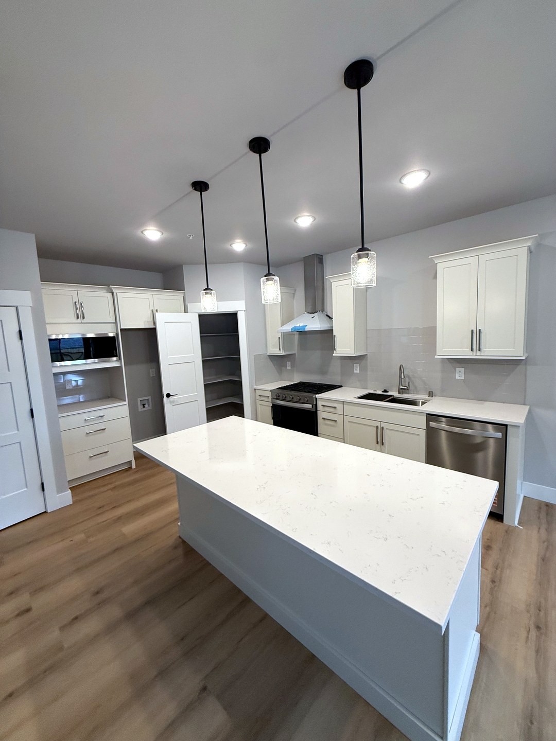 Glossy grey subway tile kitchen backsplash